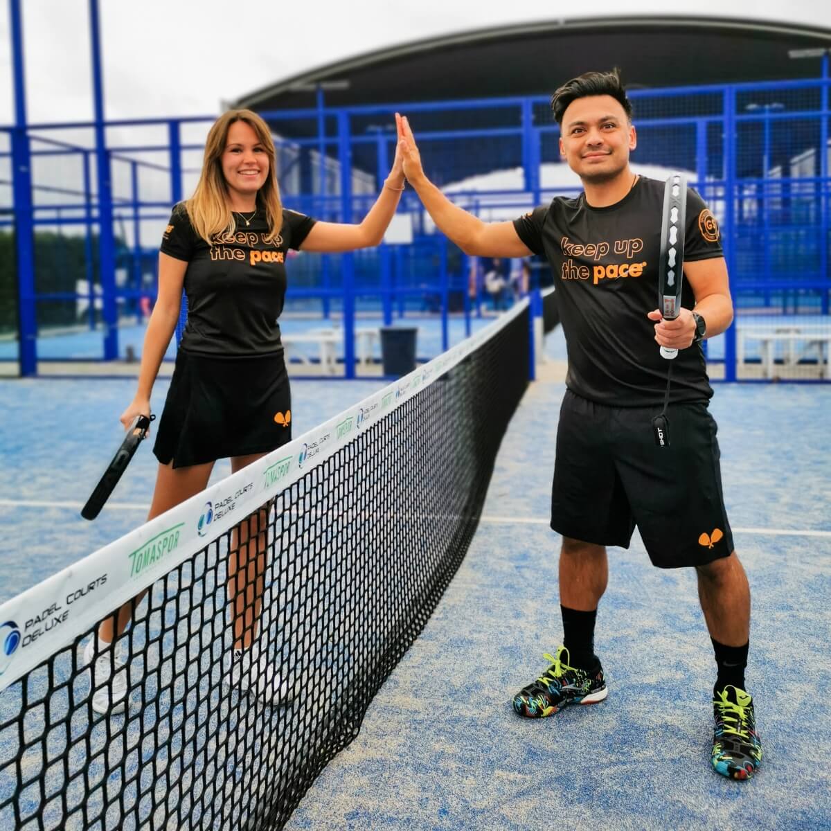 Pace sport t-shirt dames / heren zwart oranje