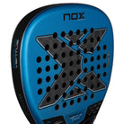 Detail slagoppervlak Nox EA10 Ventus Attack 12K Xtreme 2026 – Edu Alonso Edition. Diamantvormig padelracket met 12K Carbon, Multilayer Black EVA-kern en 3D-Rough Surface voor krachtig aanvallend spel.