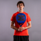 Edu Alonso met blauw padel racket Nox Ventus Hybrid 12k 2027 by Edu Alonso